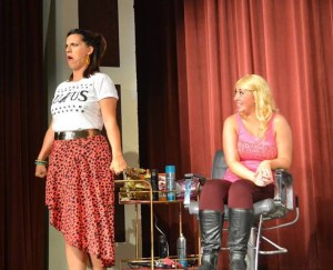 Amy Studabaker (left) is townie hairdresser Paulette and Peyton Cole is Harvard law student Elle Woods in the CrazyLake Acting Company production of 